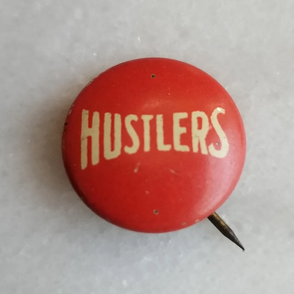 Vintage hustlers button